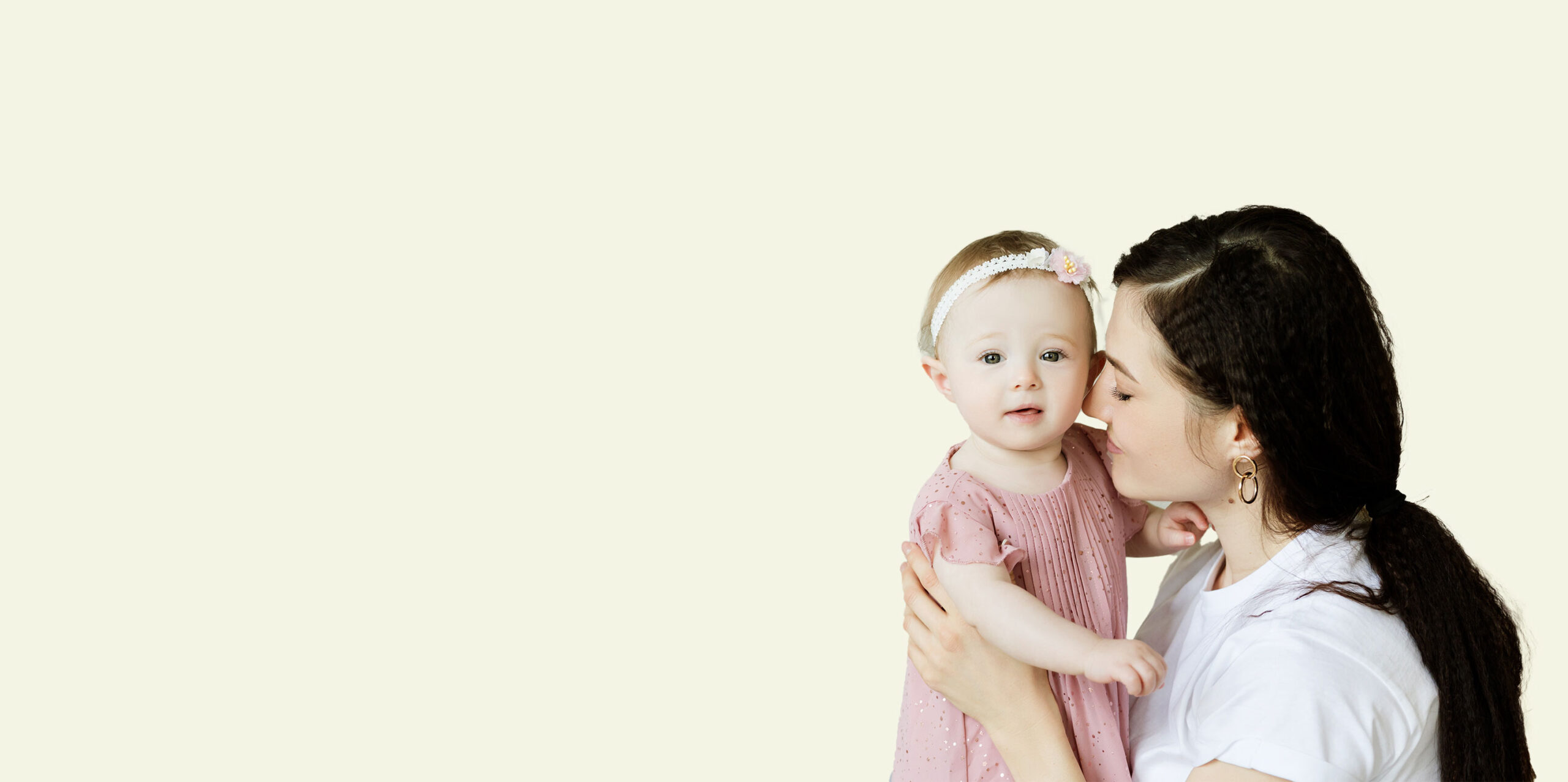 A mother holds her baby after spending time as a patient at the Grapevine, Texas location of IVFMD