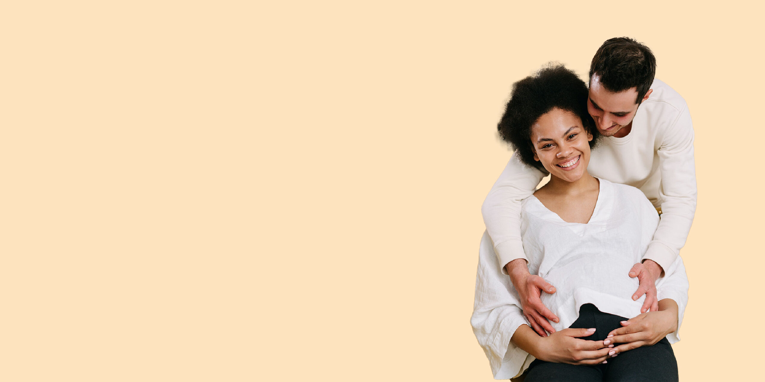 A couple celebrates their pregnancy after exploring fertility financing with IVFMD in Texas